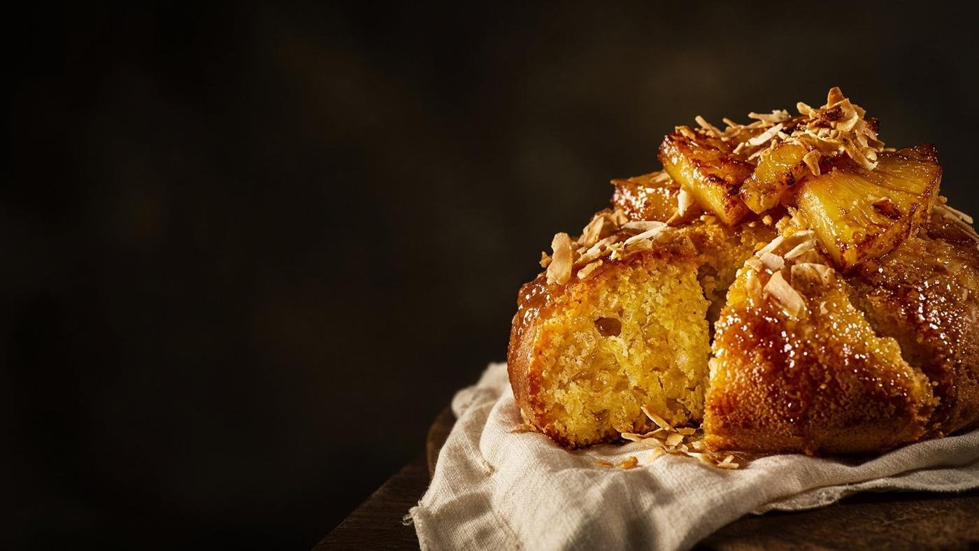 Golden rum cake with pineapple and coconut